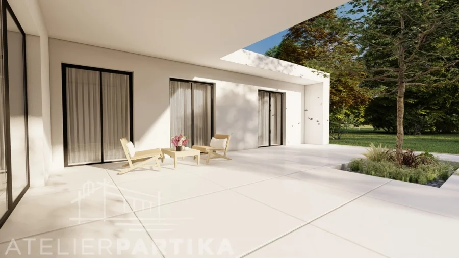 Exteriér – Rodinný dům Hukvaldy, zastřešená terasa s lounge křesly a prosklenými dveřmi